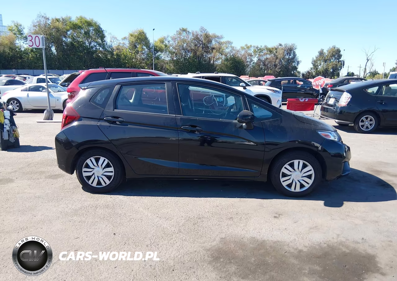 2015 Honda Fit Lx VIN:3HGGK5H58FM717677 - 13