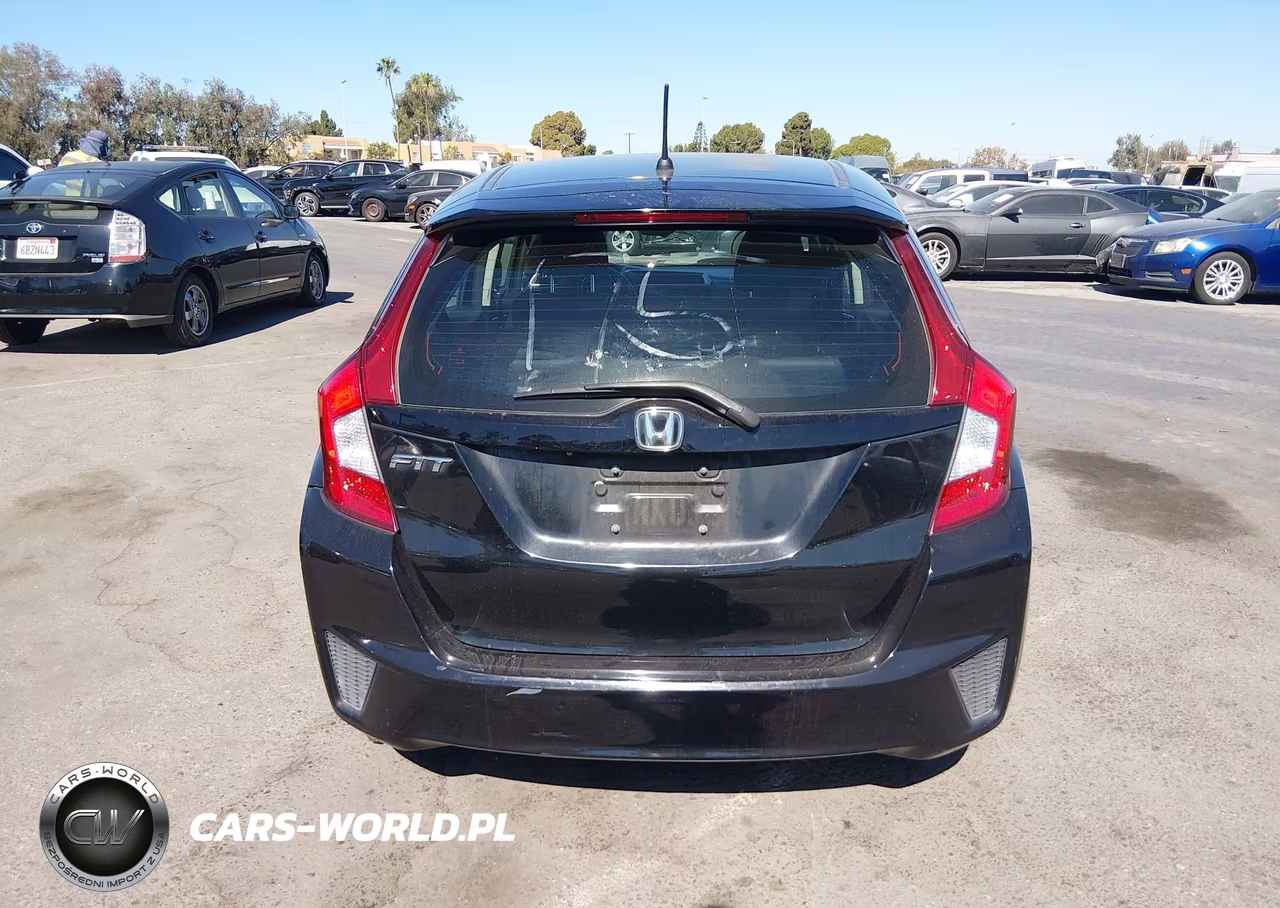 2015 Honda Fit Lx VIN:3HGGK5H58FM717677 - 16
