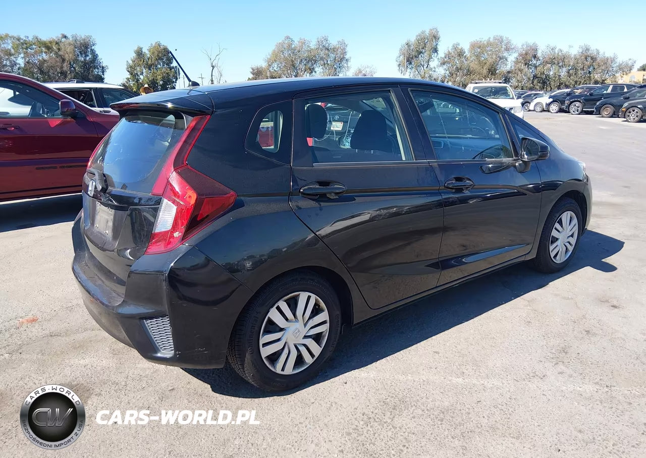 2015 Honda Fit Lx VIN:3HGGK5H58FM717677 - 4