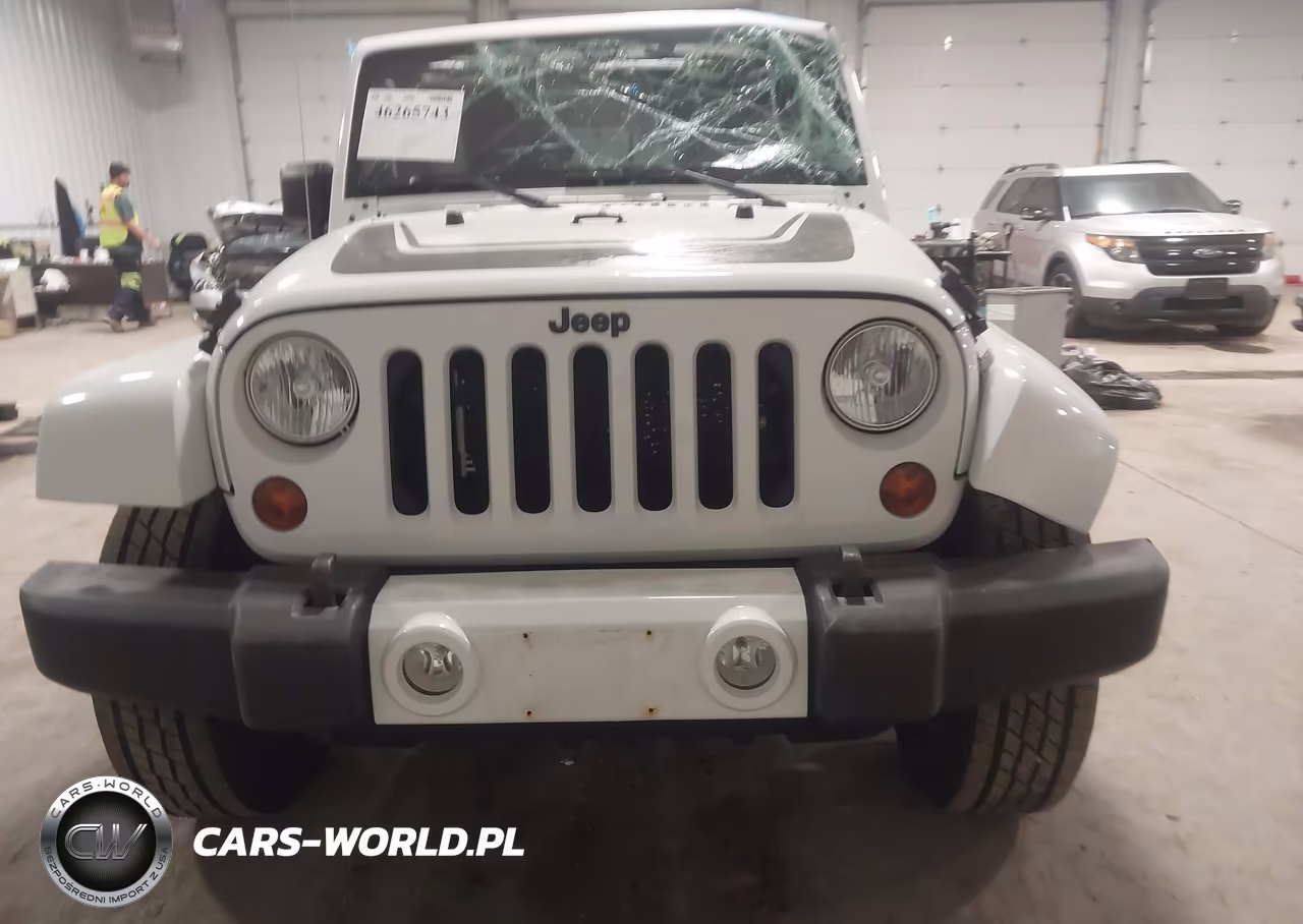 2012 Jeep Wrangler Unlimited Sahara VIN:1C4HJWEG4CL269677 - 12