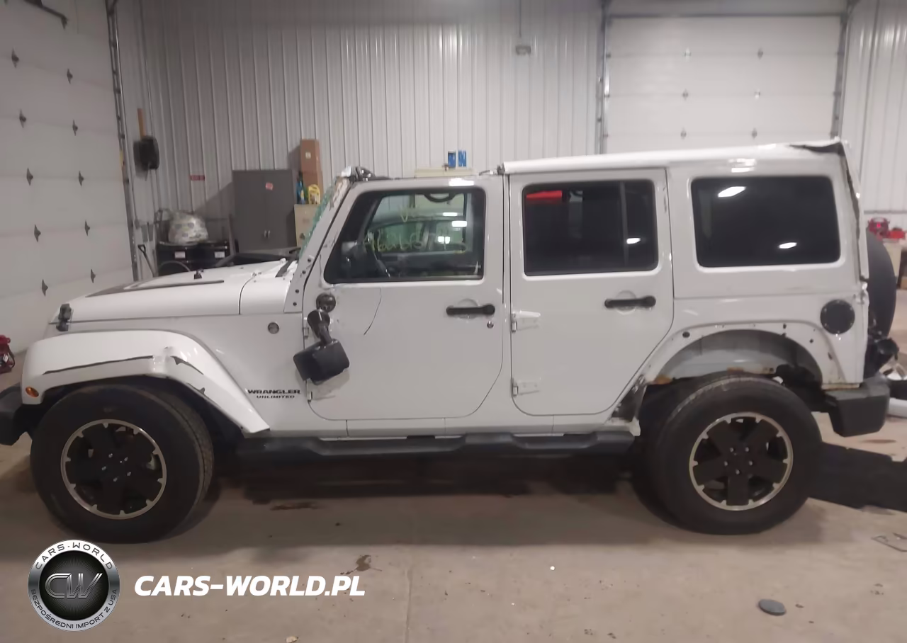 2012 Jeep Wrangler Unlimited Sahara VIN:1C4HJWEG4CL269677 - 14
