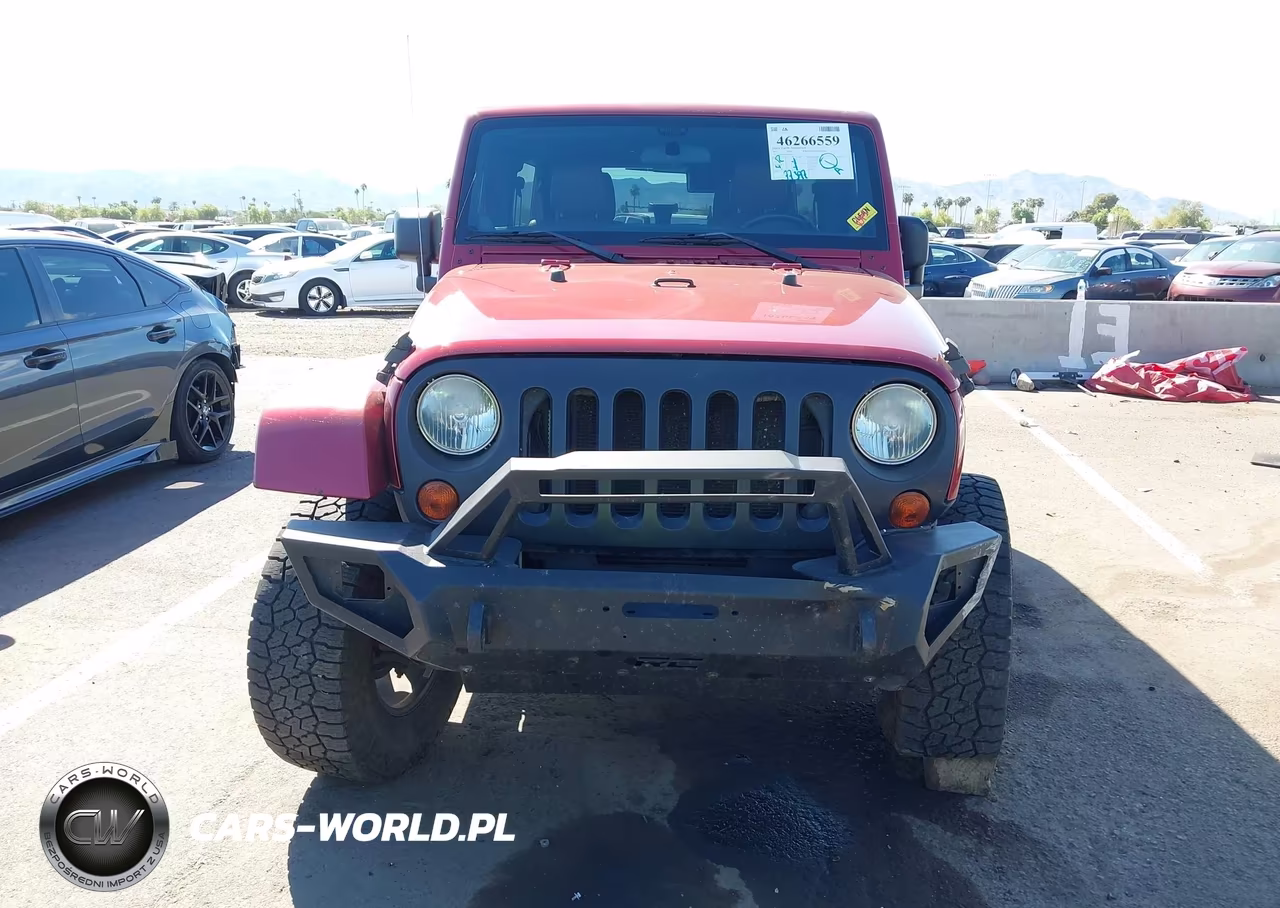 2011 Jeep Wrangler Unlimited Sahara VIN:1J4BA5H11BL575753 - 13