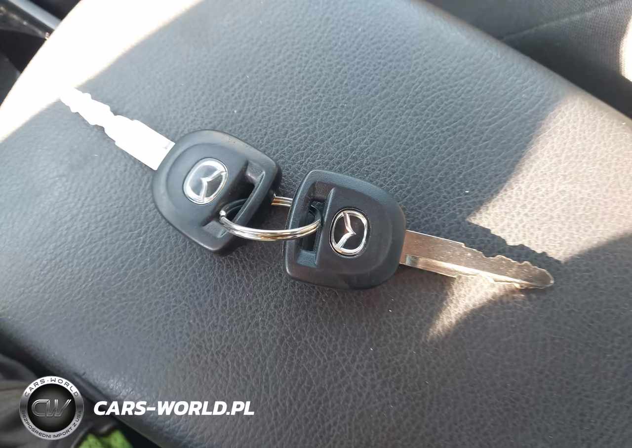2011 Mazda Mazda3 I Touring VIN:JM1BL1VG9B1380271 - 11