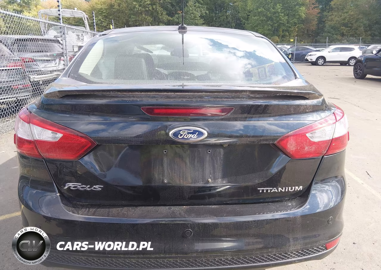 2013 Ford Focus Titanium VIN:1FADP3J22DL215551 - 17