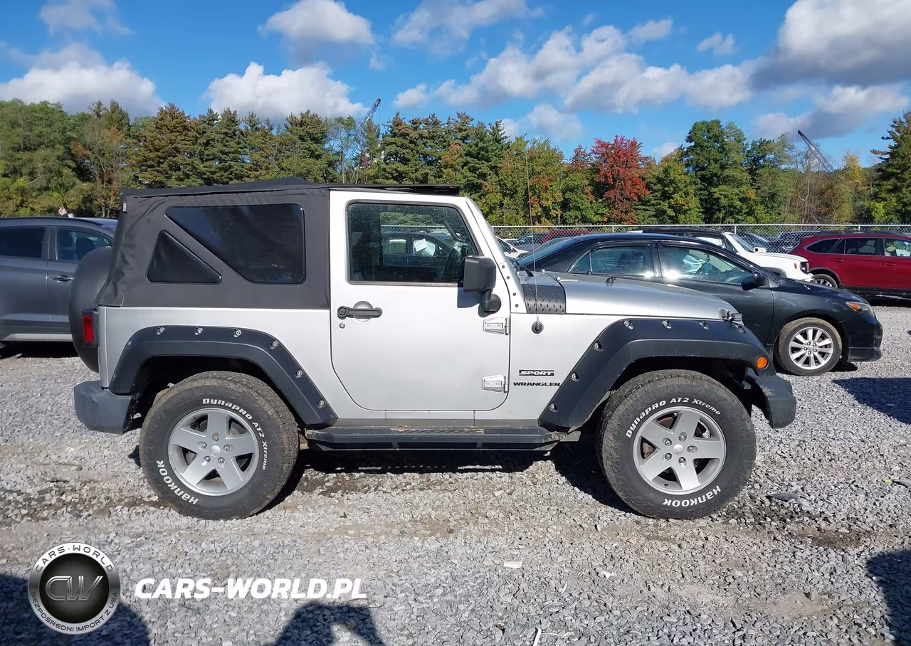 2011 Jeep Wrangler Sport VIN:1J4AA2D11BL502673 - 13