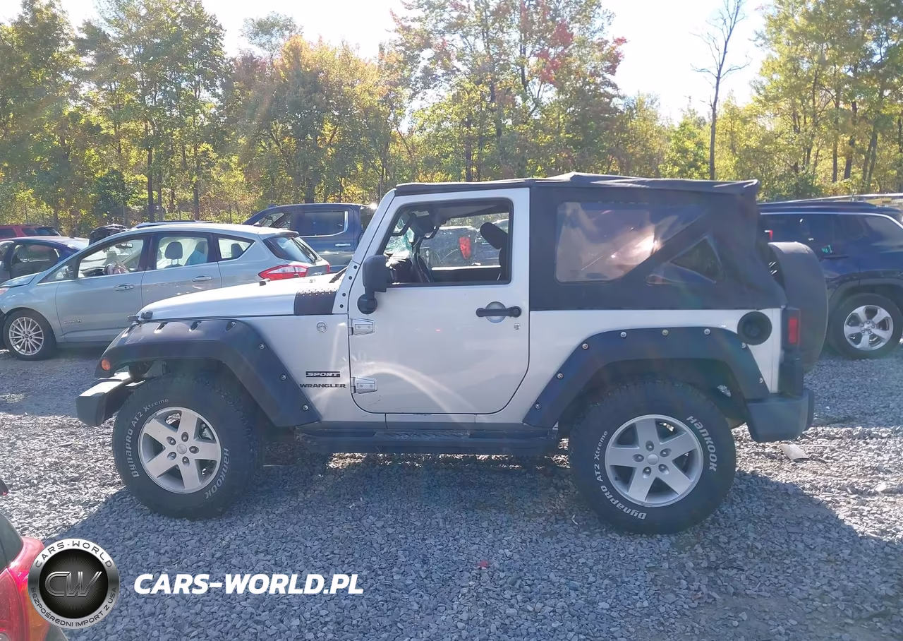 2011 Jeep Wrangler Sport VIN:1J4AA2D11BL502673 - 14