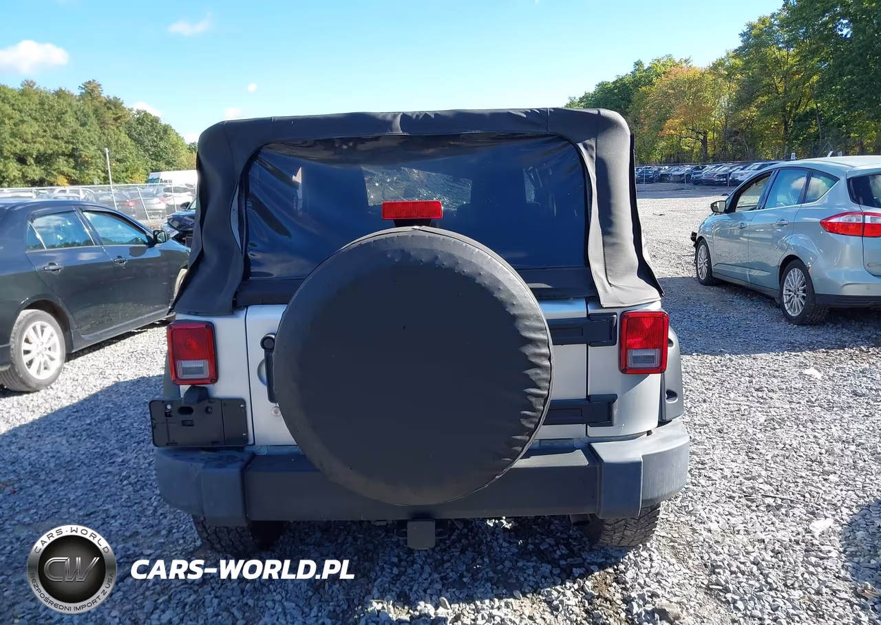 2011 Jeep Wrangler Sport VIN:1J4AA2D11BL502673 - 16
