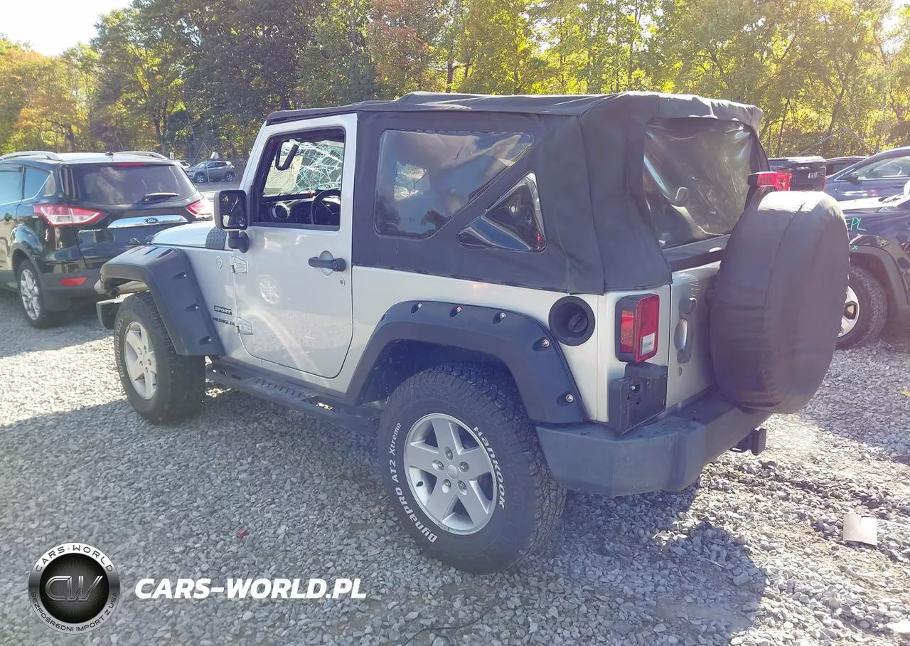2011 Jeep Wrangler Sport VIN:1J4AA2D11BL502673 - 3