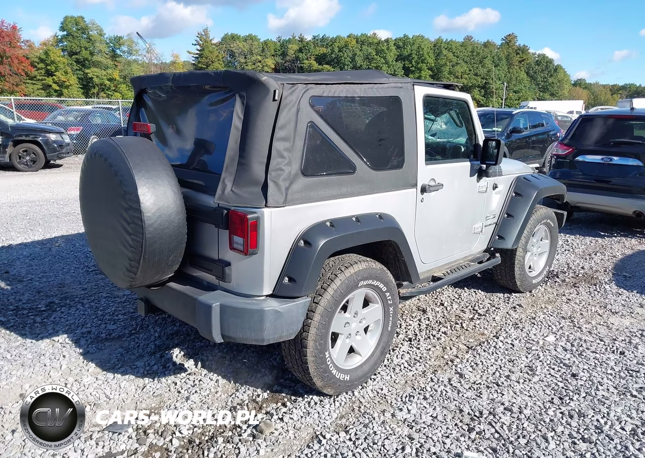 2011 Jeep Wrangler Sport VIN:1J4AA2D11BL502673 - 4