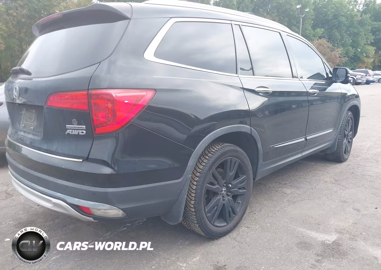 2018 Honda Pilot Touring VIN:5FNYF6H98JB030566 - 4