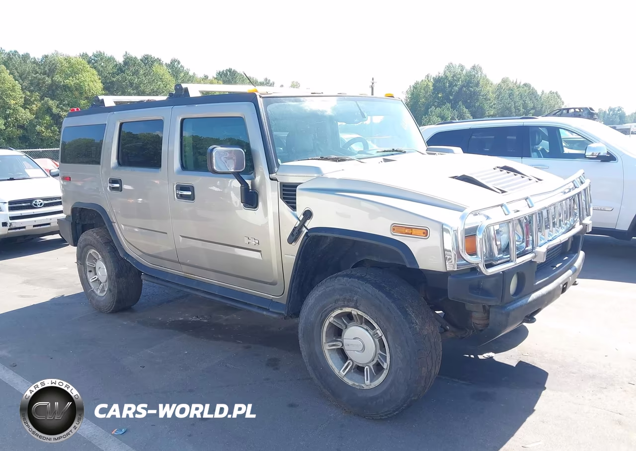 2003 Hummer H2 VIN:5GRGN23U63H116852 - 1