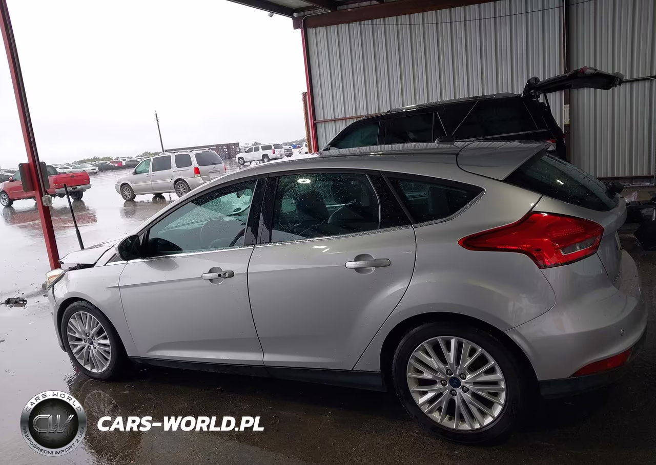 2016 Ford Focus Titanium VIN:1FADP3N28GL370832 - 14