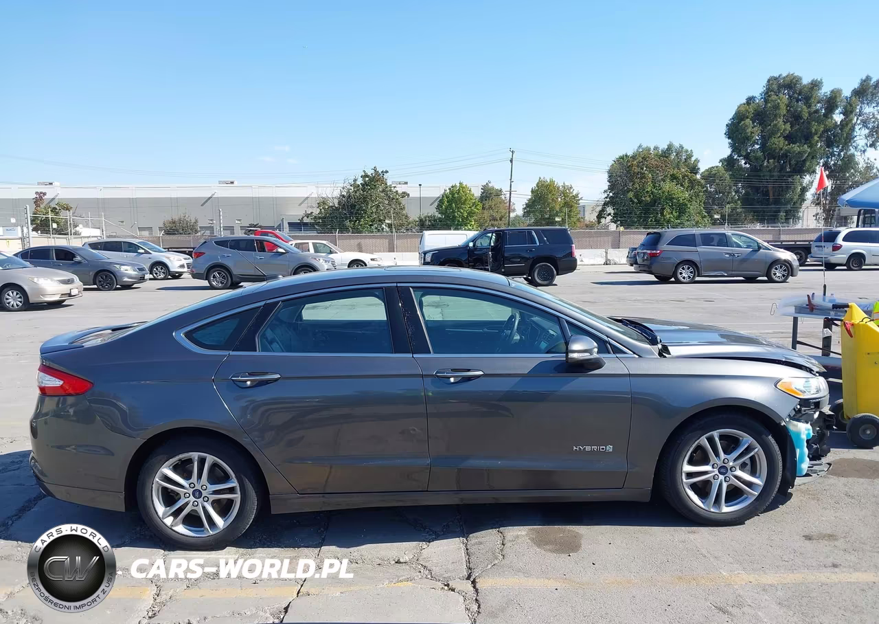 2016 Ford Fusion Hybrid Titanium VIN:3FA6P0RU3GR166377 - 14