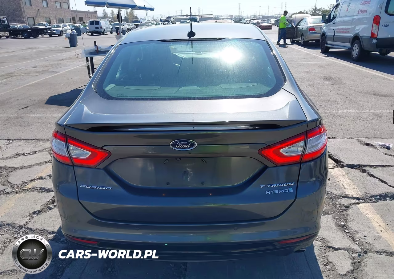2016 Ford Fusion Hybrid Titanium VIN:3FA6P0RU3GR166377 - 17