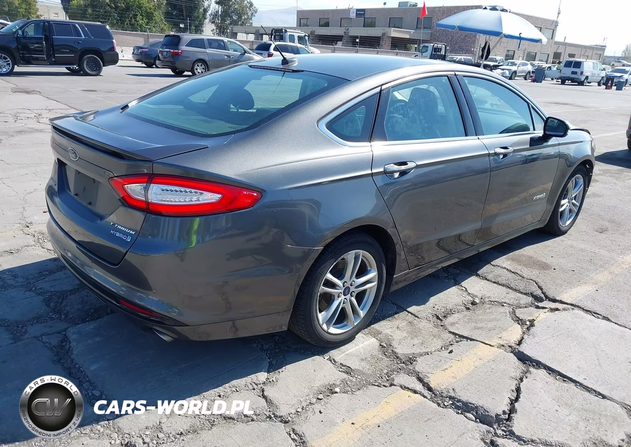 2016 Ford Fusion Hybrid Titanium VIN:3FA6P0RU3GR166377 - 4