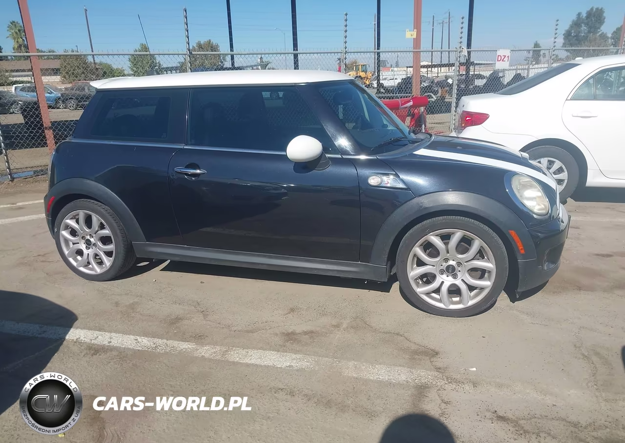 2009 Mini Cooper S VIN:WMWMF73519TV39896 - 13