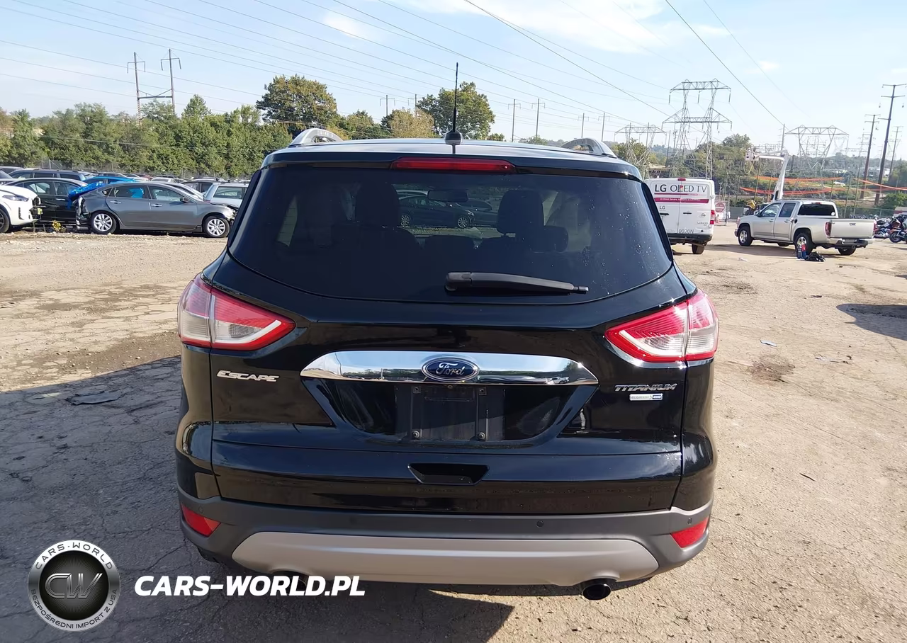 2016 Ford Escape Titanium VIN:1FMCU9J97GUA01924 - 16