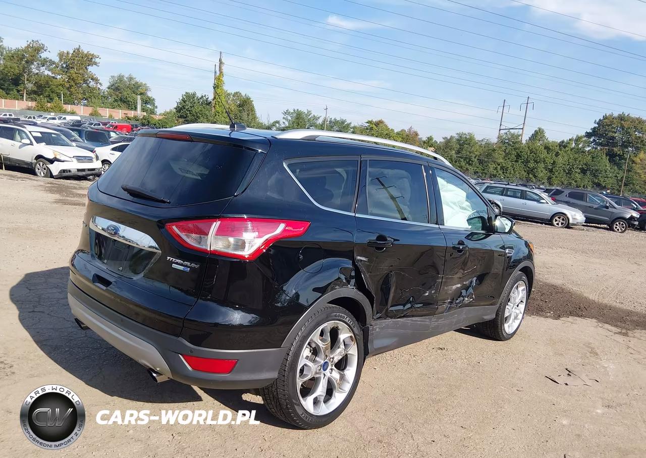 2016 Ford Escape Titanium VIN:1FMCU9J97GUA01924 - 4