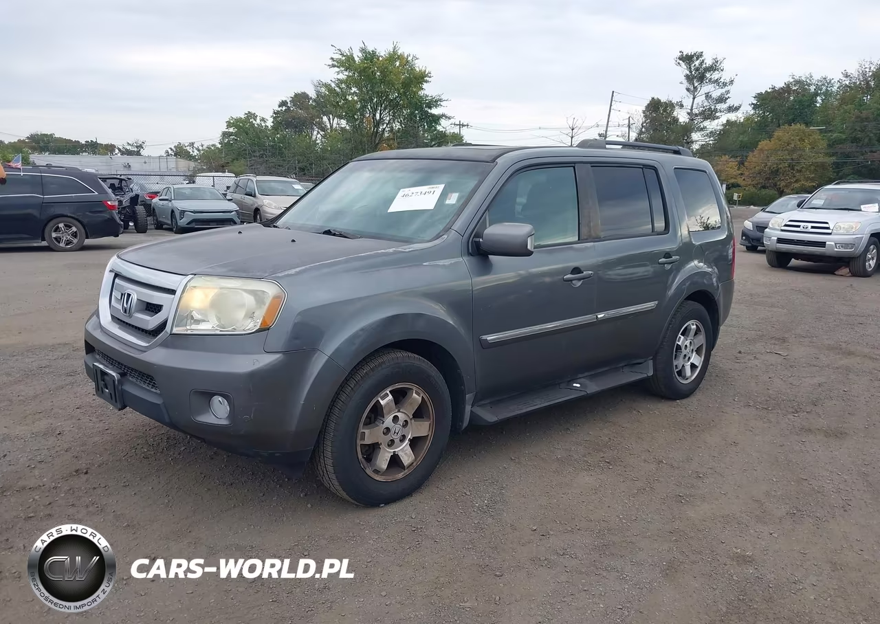 2011 Honda Pilot Touring VIN:5FNYF3H95BB013126 - 2