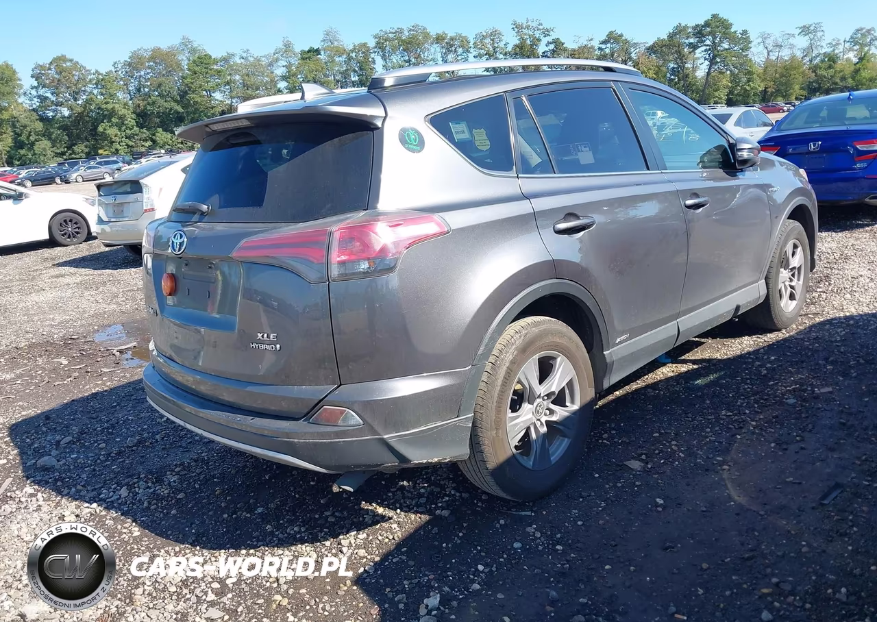 2018 Toyota Rav4 Hybrid Xle VIN:JTMRJREV2JD203124 - 4