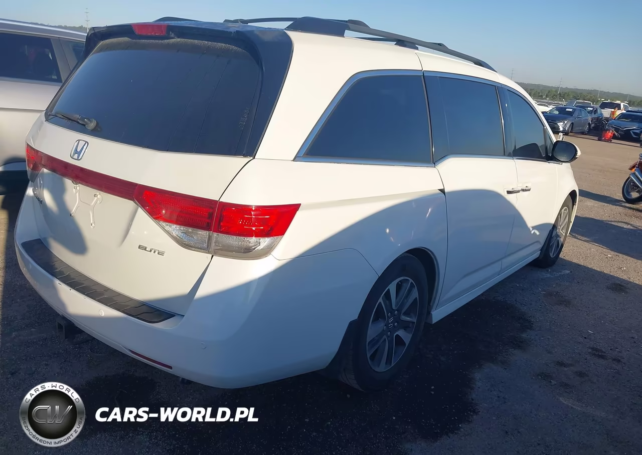 2015 Honda Odyssey Touring-Touring Elite VIN:5FNRL5H98FB059323 - 4