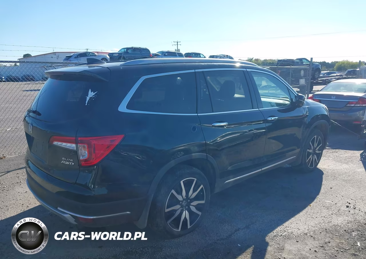 2019 Honda Pilot Elite VIN:5FNYF6H02KB035412 - 4