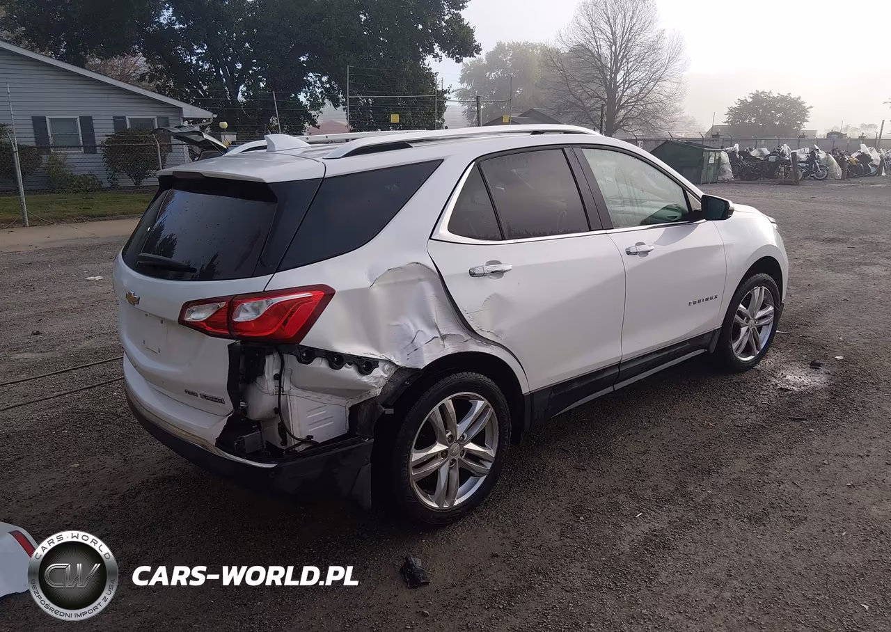 2018 Chevrolet Equinox Premier VIN:2GNAXVEV1J6118267 - 4