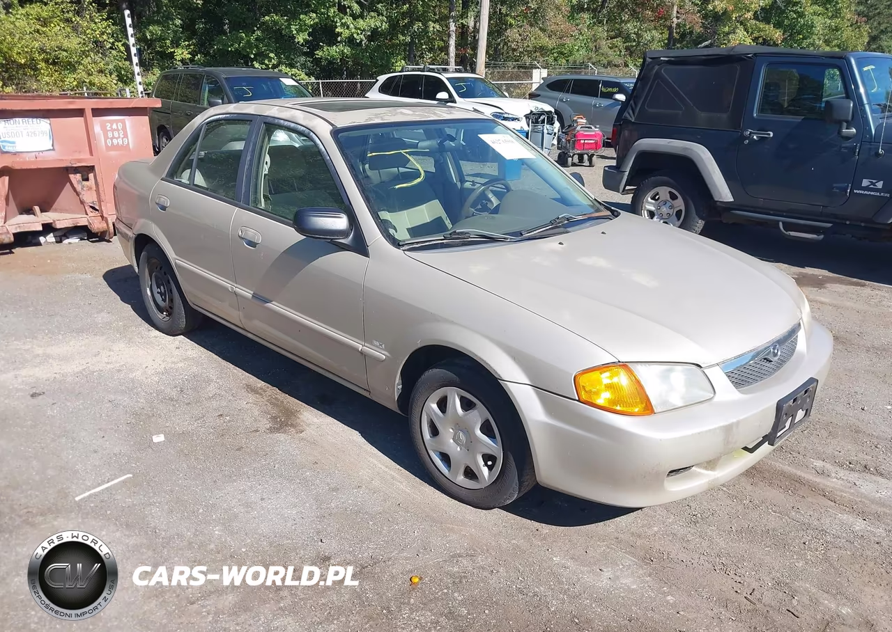 2000 Mazda Protege Dx-Lx VIN:JM1BJ2248Y0257792 - 1