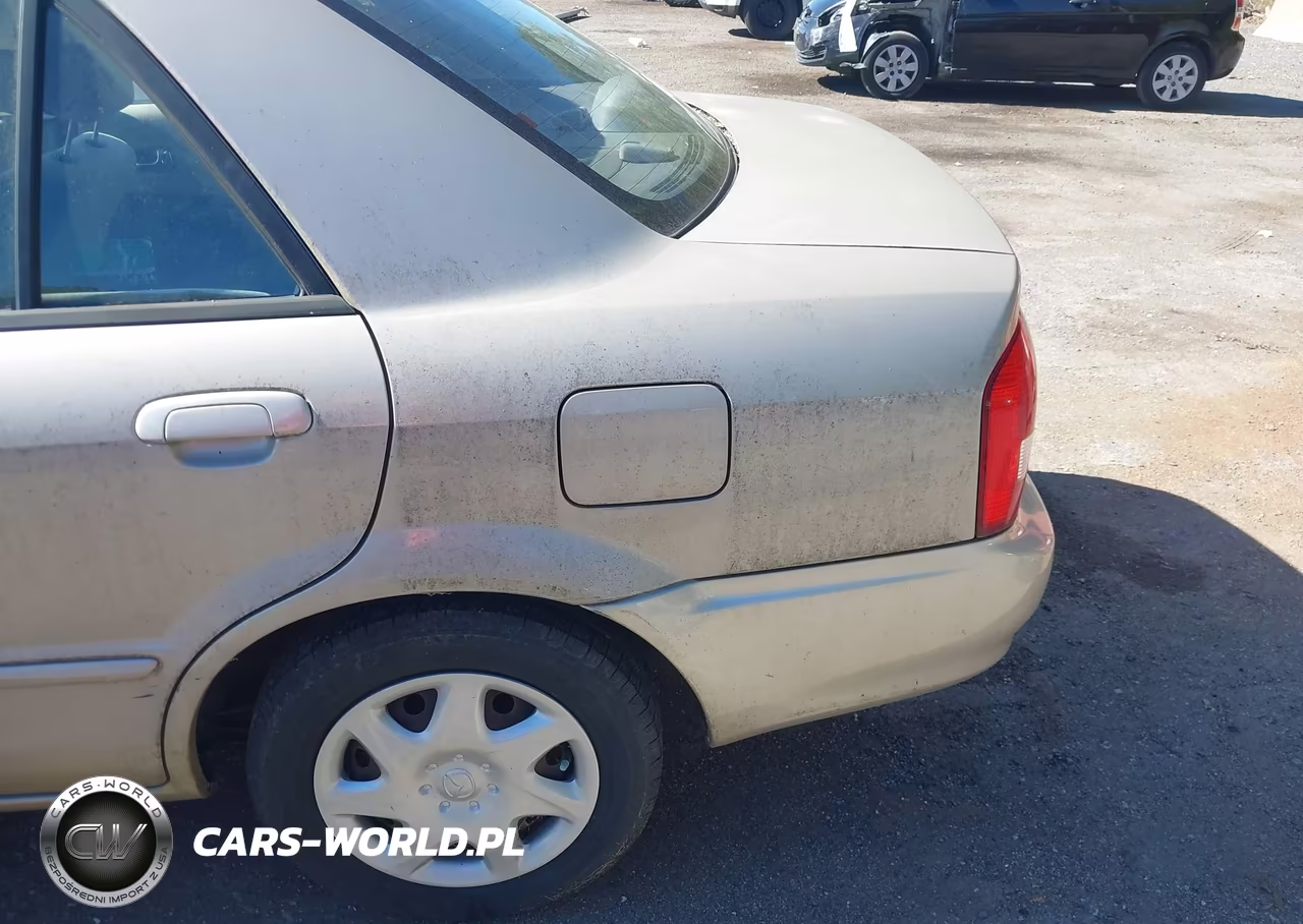 2000 Mazda Protege Dx-Lx VIN:JM1BJ2248Y0257792 - 6