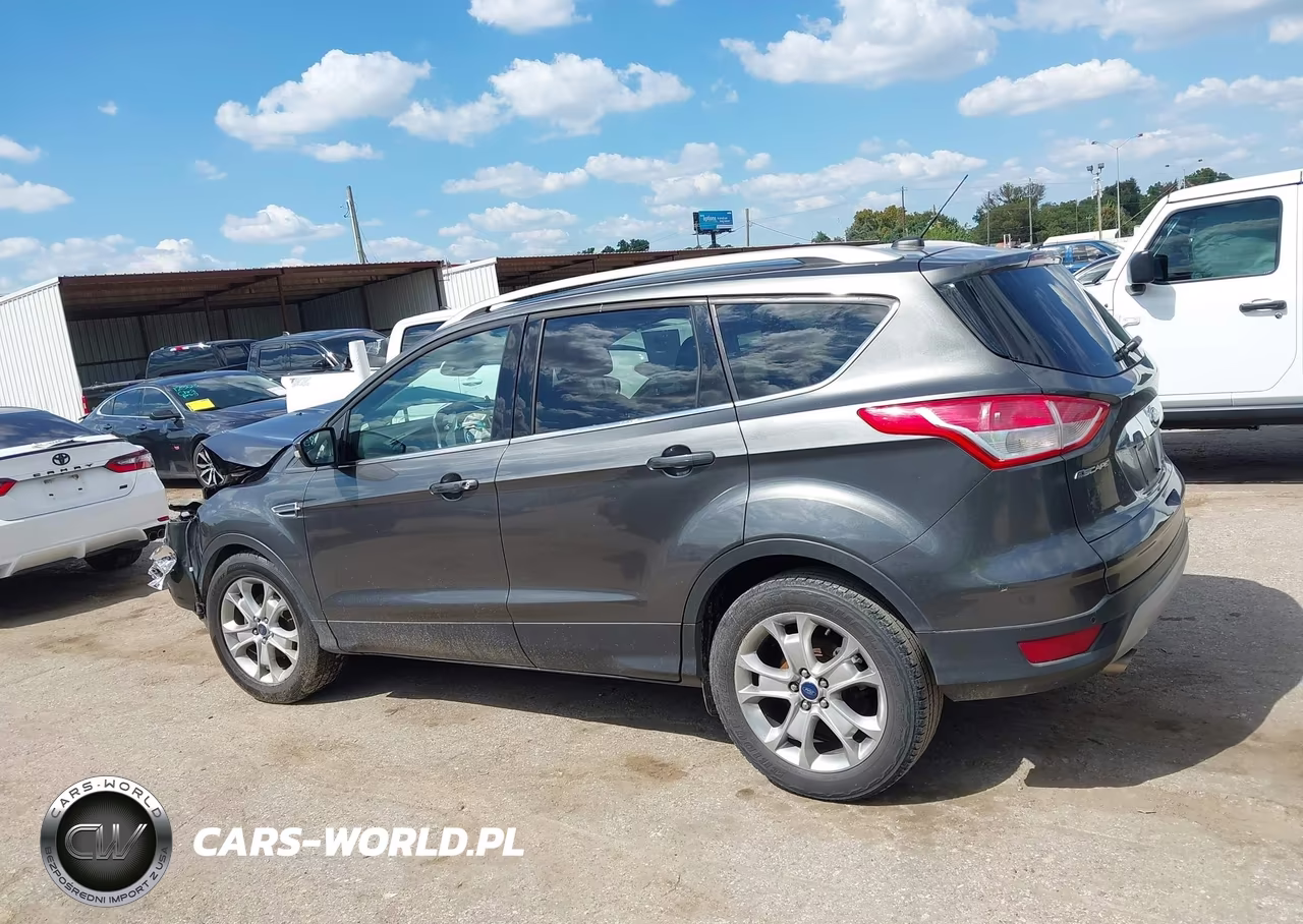 2016 Ford Escape Titanium VIN:1FMCU0JX5GUA11216 - 14