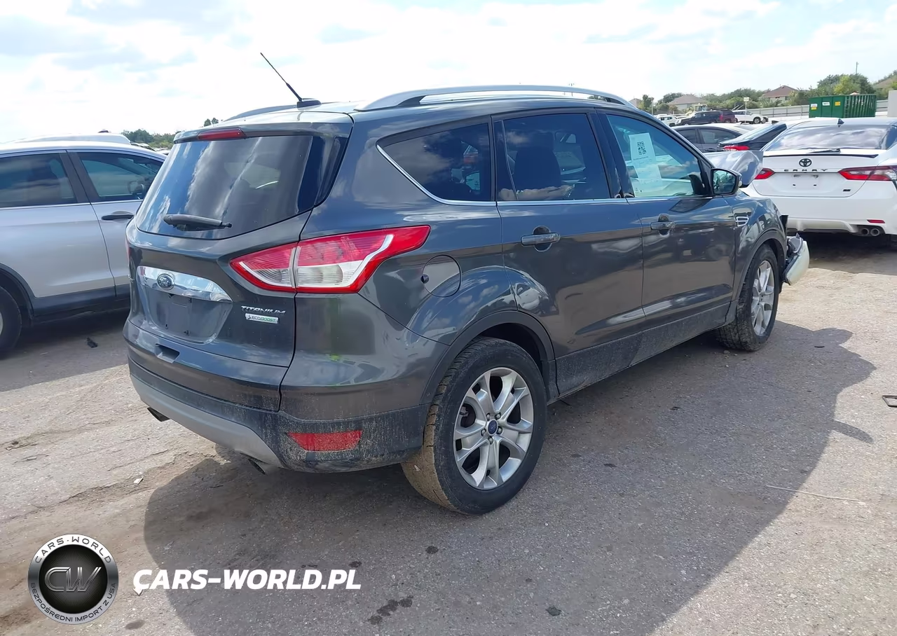 2016 Ford Escape Titanium VIN:1FMCU0JX5GUA11216 - 4