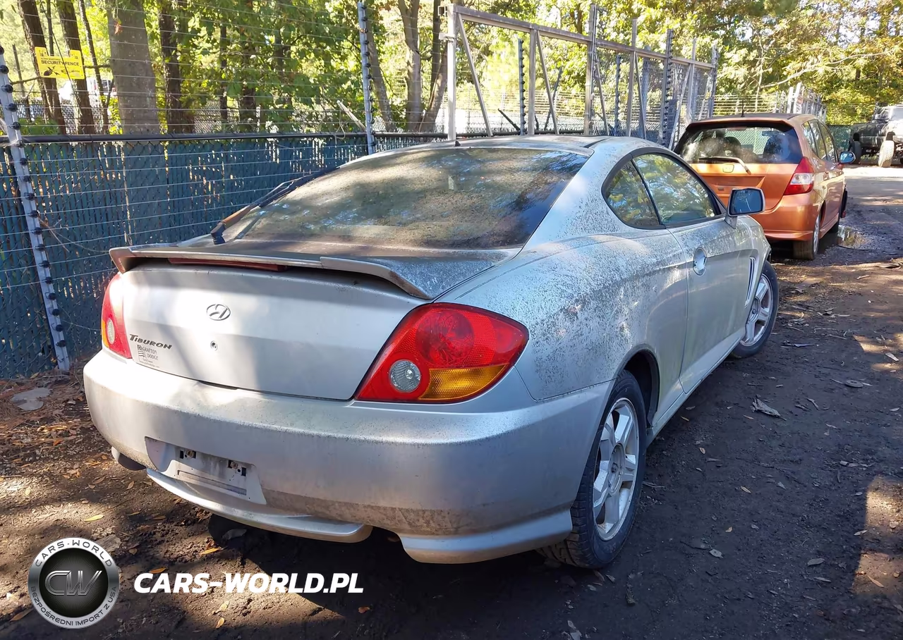 2003 Hyundai Tiburon VIN:KMHHM65D83U091159 - 4
