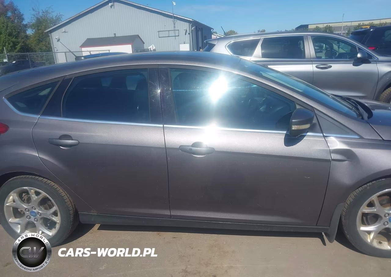 2012 Ford Focus Titanium VIN:1FAHP3N22CL283679 - 13