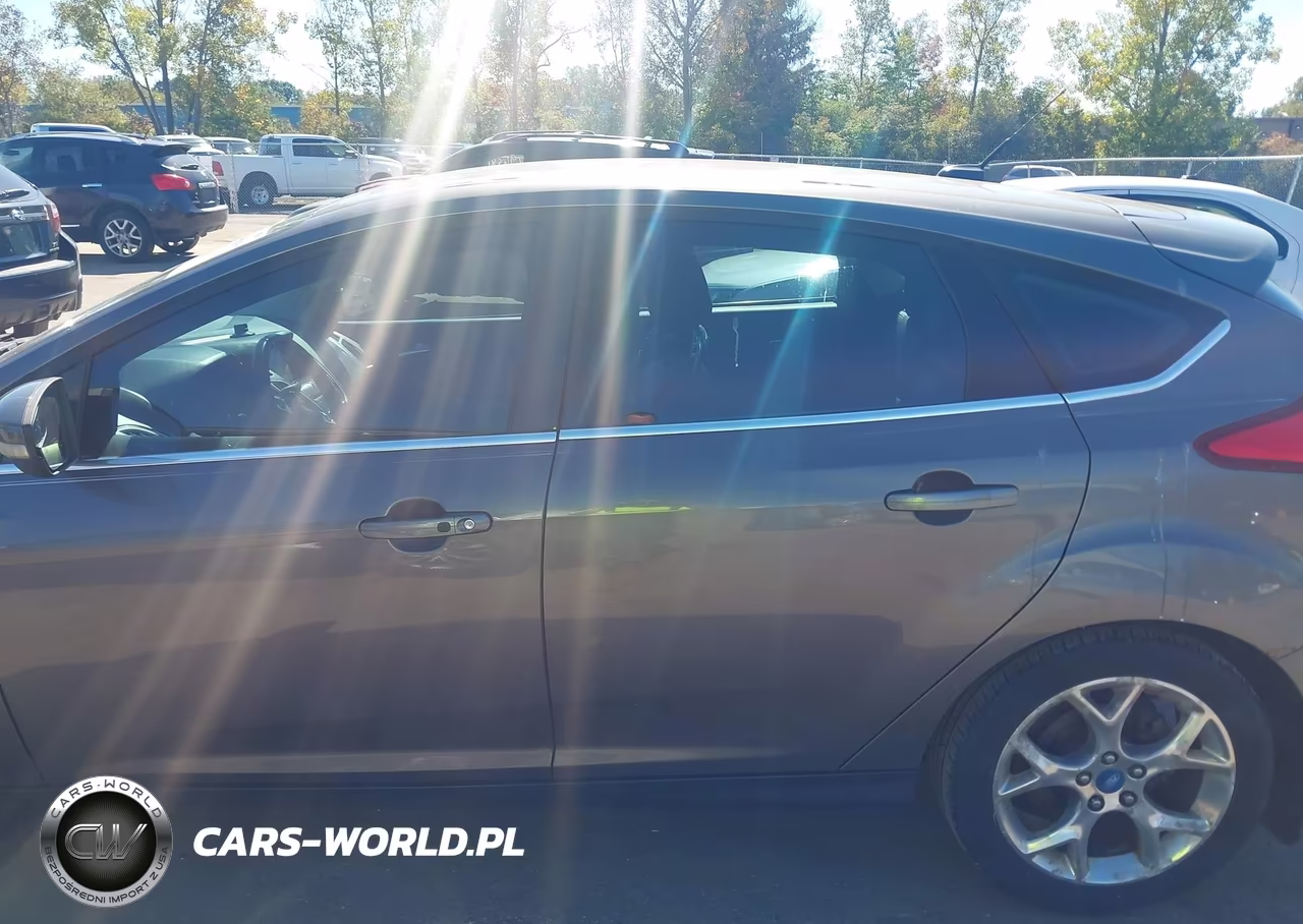 2012 Ford Focus Titanium VIN:1FAHP3N22CL283679 - 14