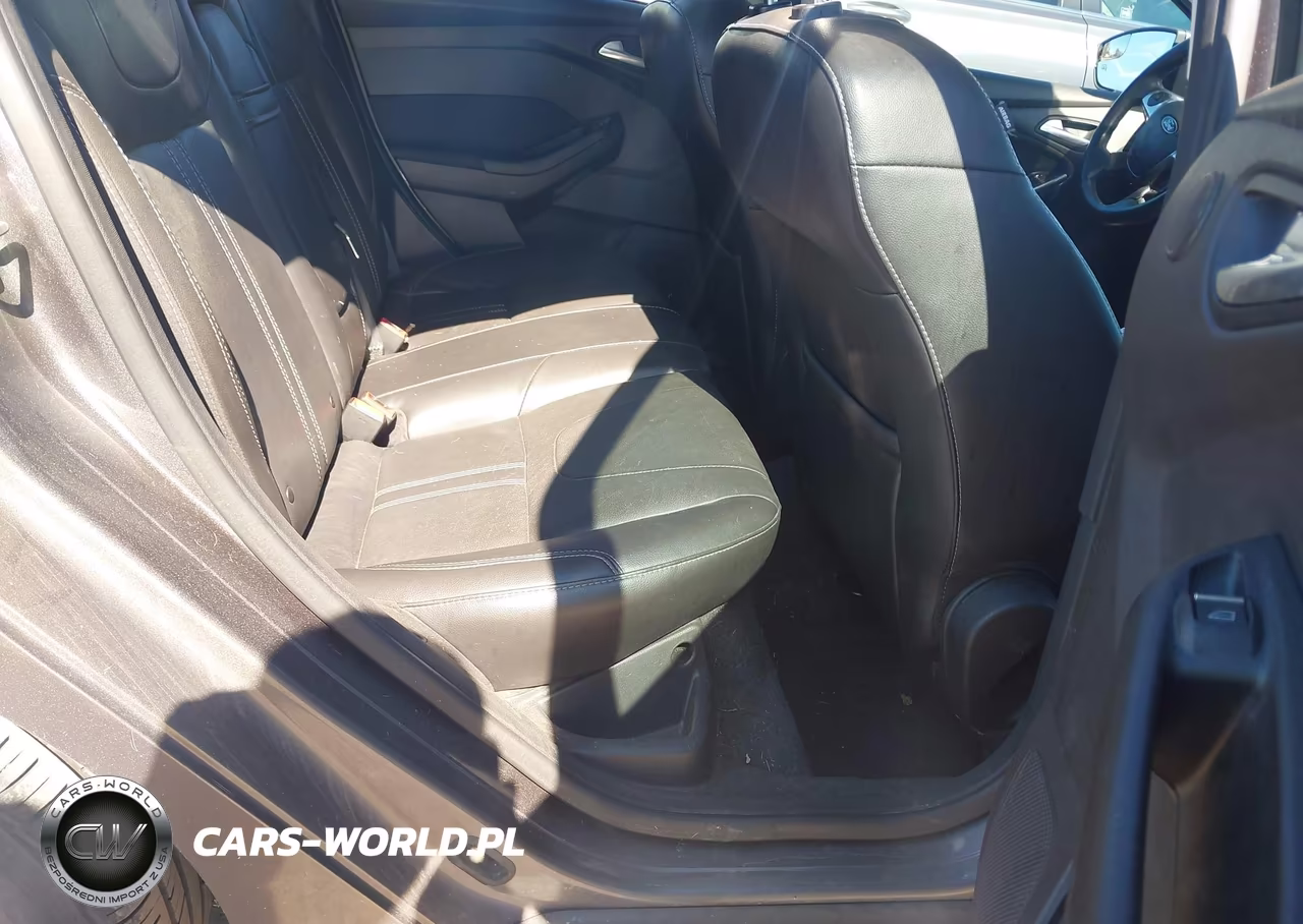 2012 Ford Focus Titanium VIN:1FAHP3N22CL283679 - 8
