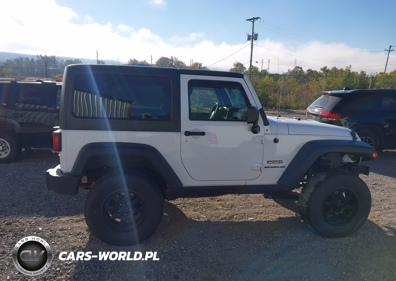 2013 Jeep Wrangler Sport VIN:1C4AJWAGXDL667789 - 13