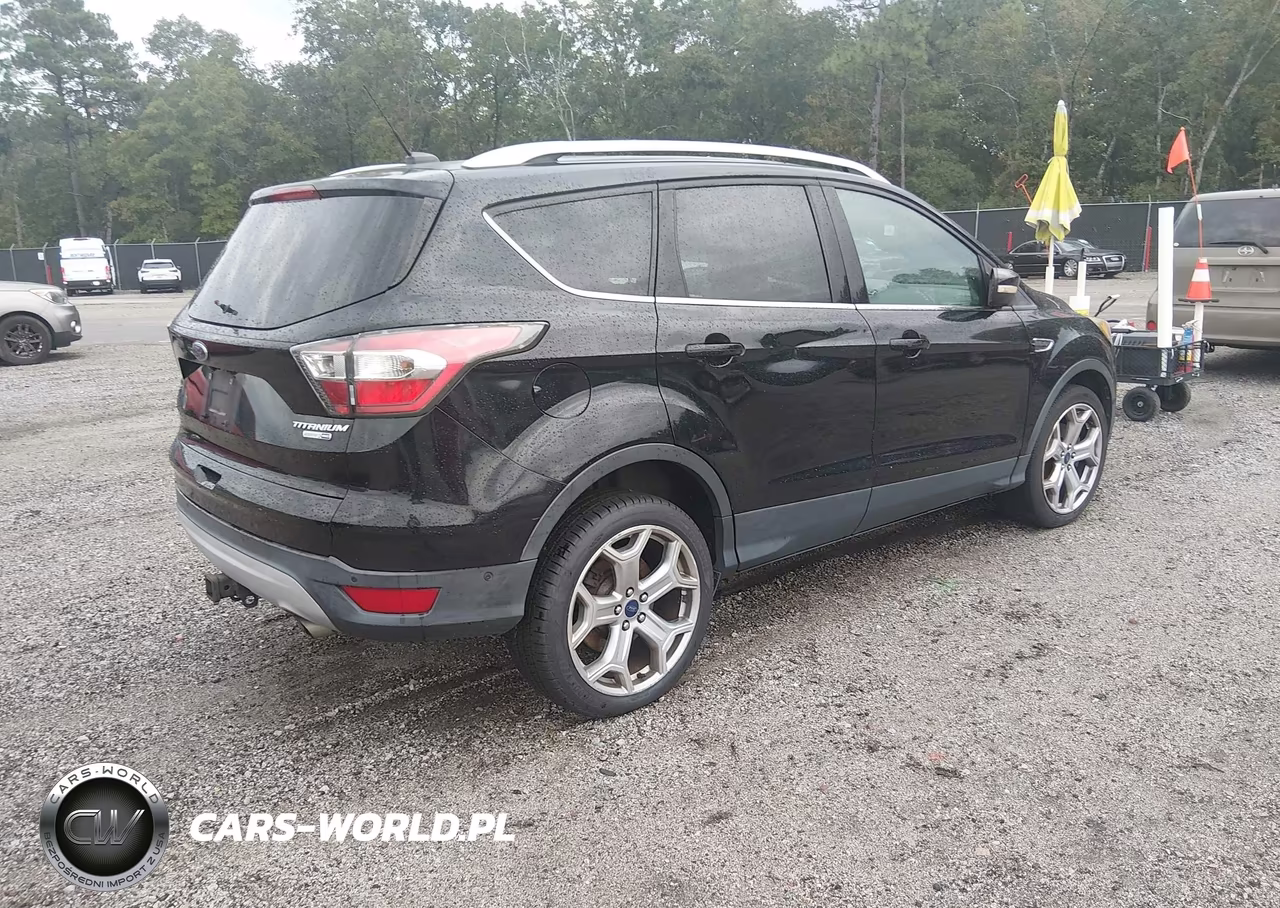 2017 Ford Escape Titanium VIN:1FMCU9J92HUA33326 - 4