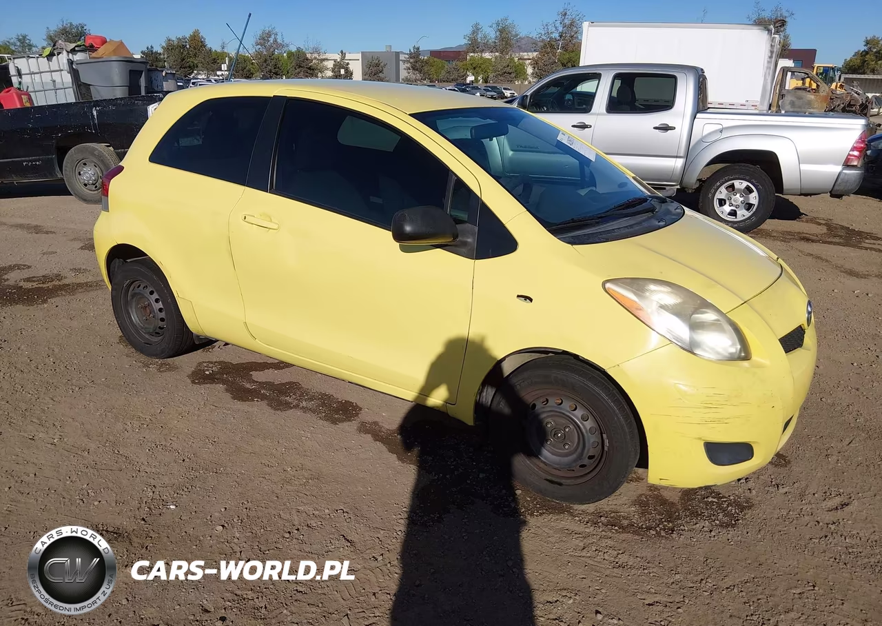 2009 Toyota Yaris VIN:JTDJT903895275593 - 1
