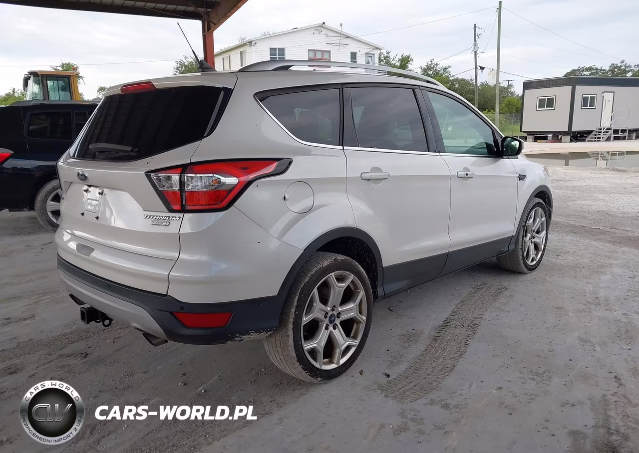2018 Ford Escape Titanium VIN:1FMCU0J91JUD26331 - 4