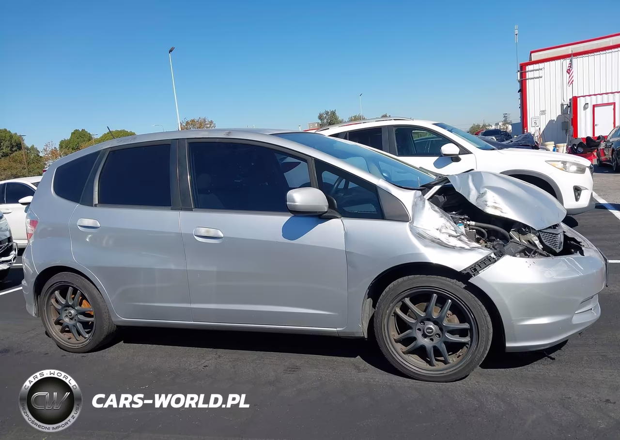 2012 Honda Fit VIN:JHMGE8H33CC025330 - 14