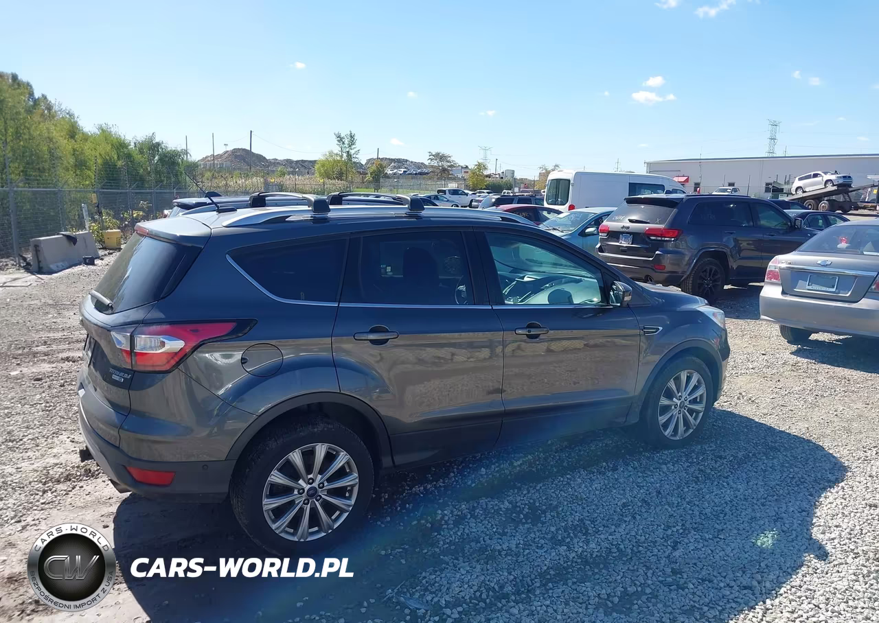 2017 Ford Escape Titanium VIN:1FMCU9J9XHUB65976 - 13