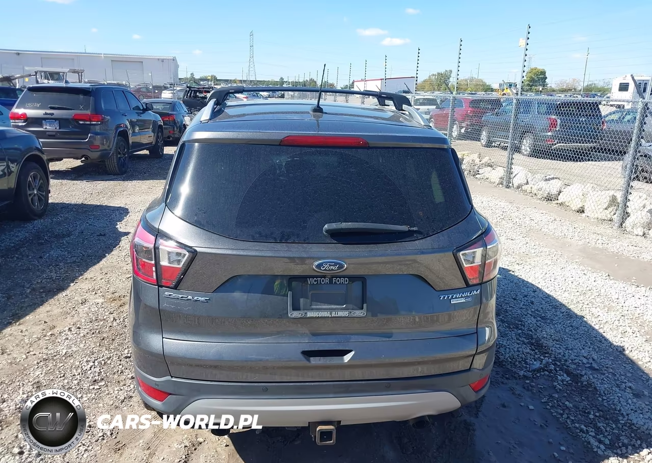2017 Ford Escape Titanium VIN:1FMCU9J9XHUB65976 - 16
