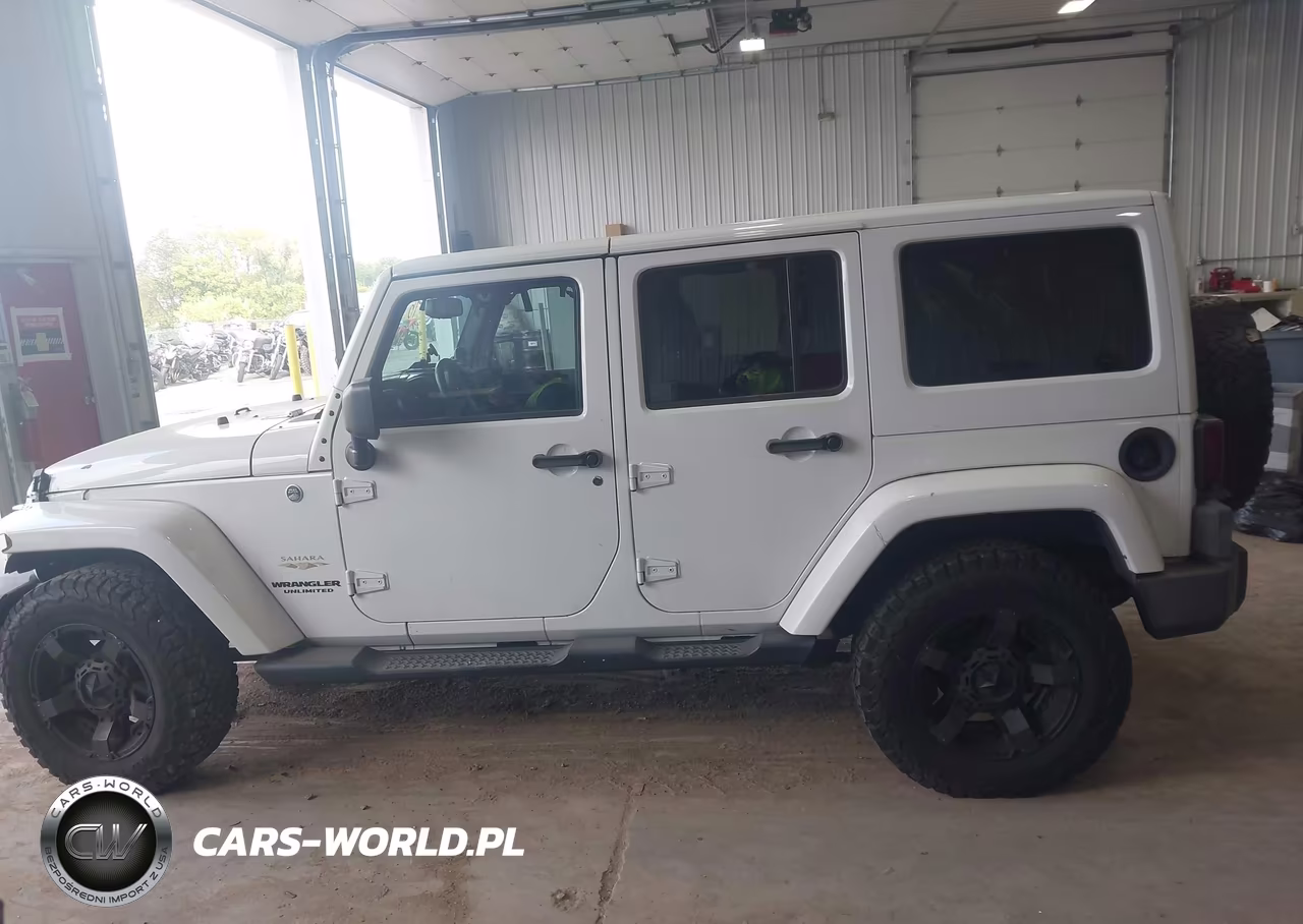 2013 Jeep Wrangler Unlimited Sahara VIN:1C4BJWEG7DL519551 - 14