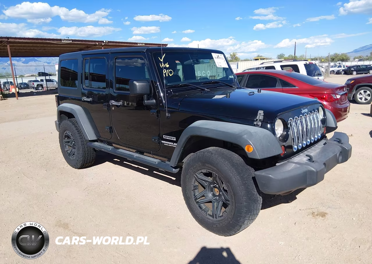 2012 Jeep Wrangler Unlimited Sport VIN:1C4BJWDG5CL274703 - 1