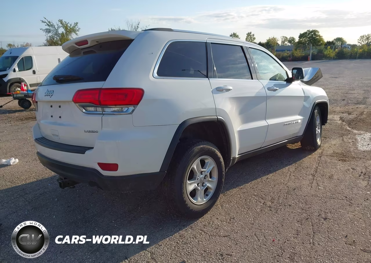 2015 Jeep Grand Cherokee Laredo VIN:1C4RJFAG1FC908869 - 4