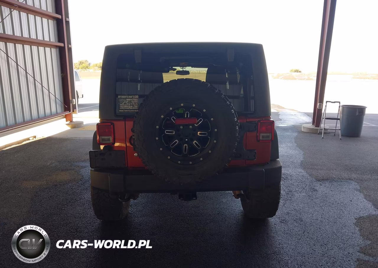 2014 Jeep Wrangler Unlimited Sport VIN:1C4BJWDGXEL232496 - 17