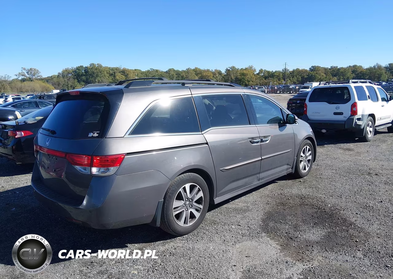 2016 Honda Odyssey Touring-Touring Elite VIN:5FNRL5H91GB045748 - 4