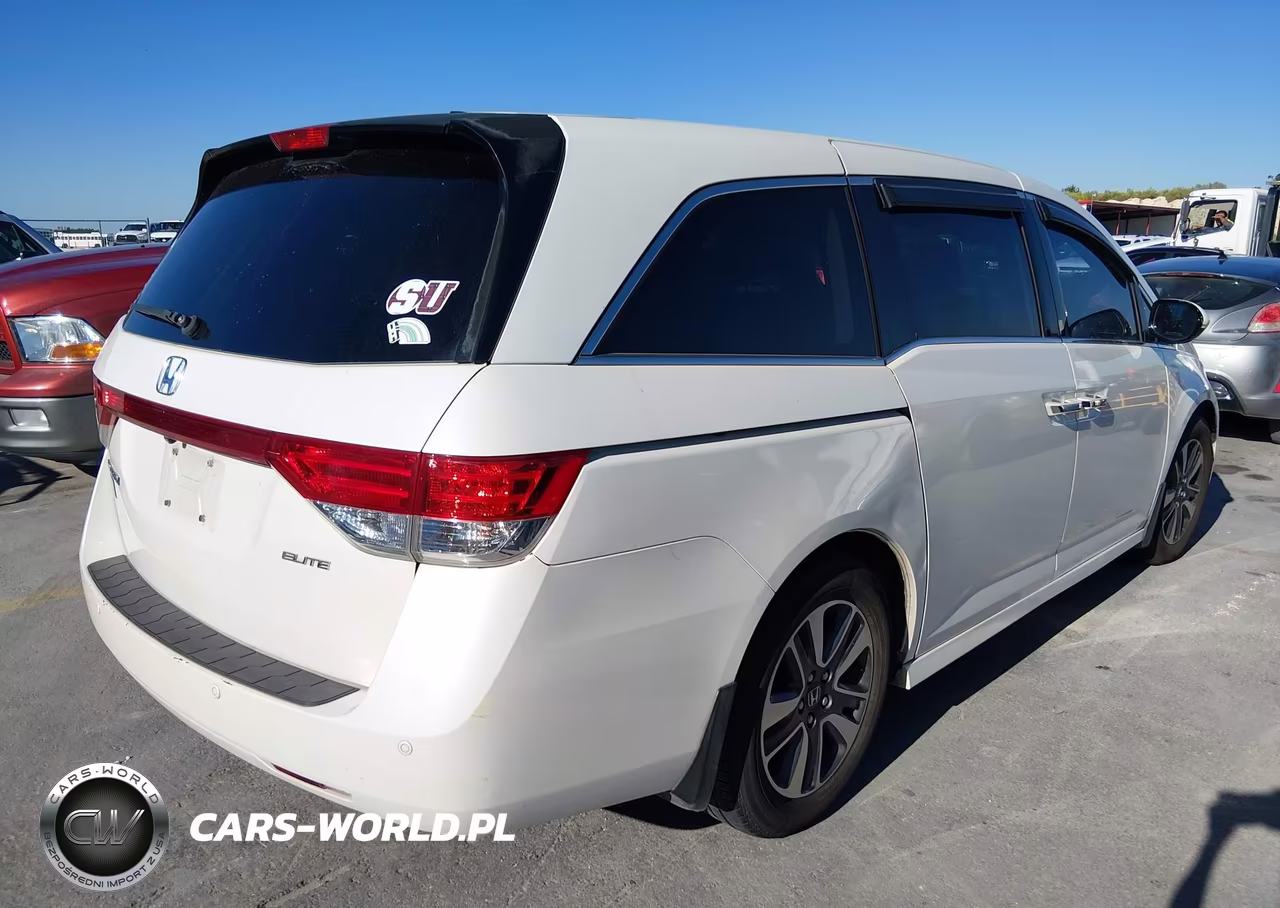 2015 Honda Odyssey Touring-Touring Elite VIN:5FNRL5H92FB076411 - 4