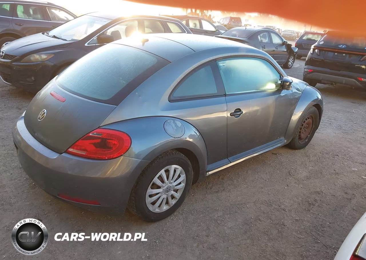 2012 Volkswagen Beetle Entry VIN:3VWFP7AT5CM638105 - 4