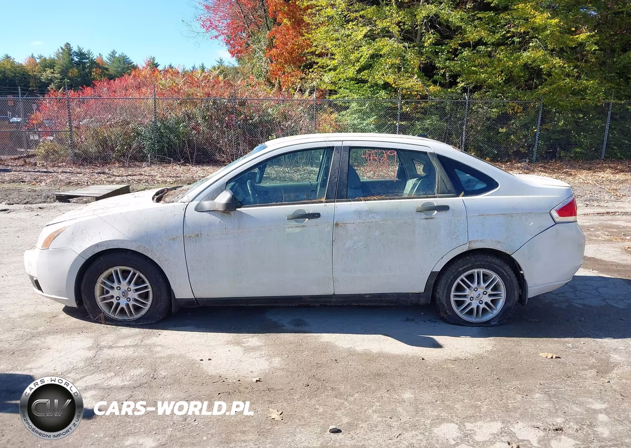 2009 Ford Focus Se VIN:1FAHP35N39W195869 - 12